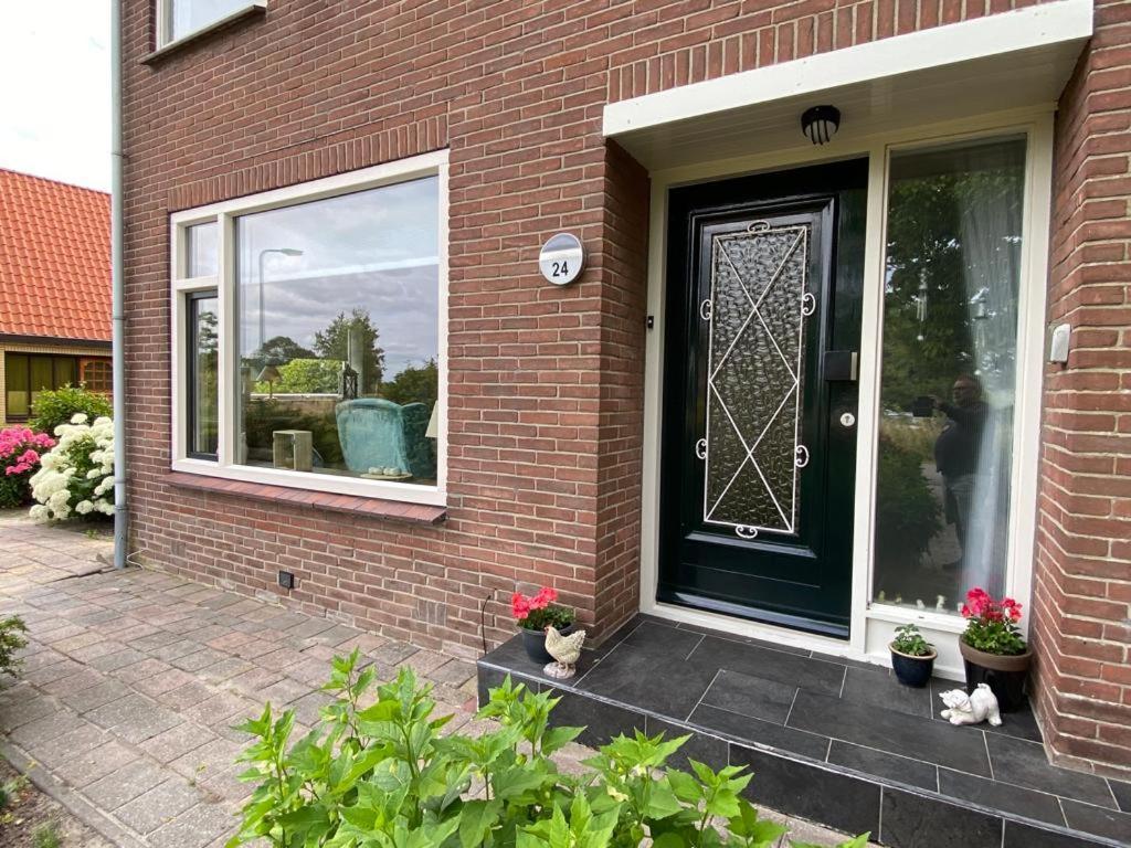 Huis Bij Het Water Met Sloepje Jutrijp Kültér fotó