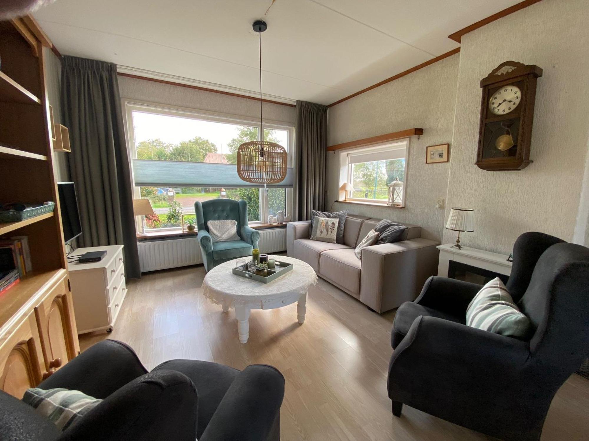 Huis Bij Het Water Met Sloepje Jutrijp Kültér fotó